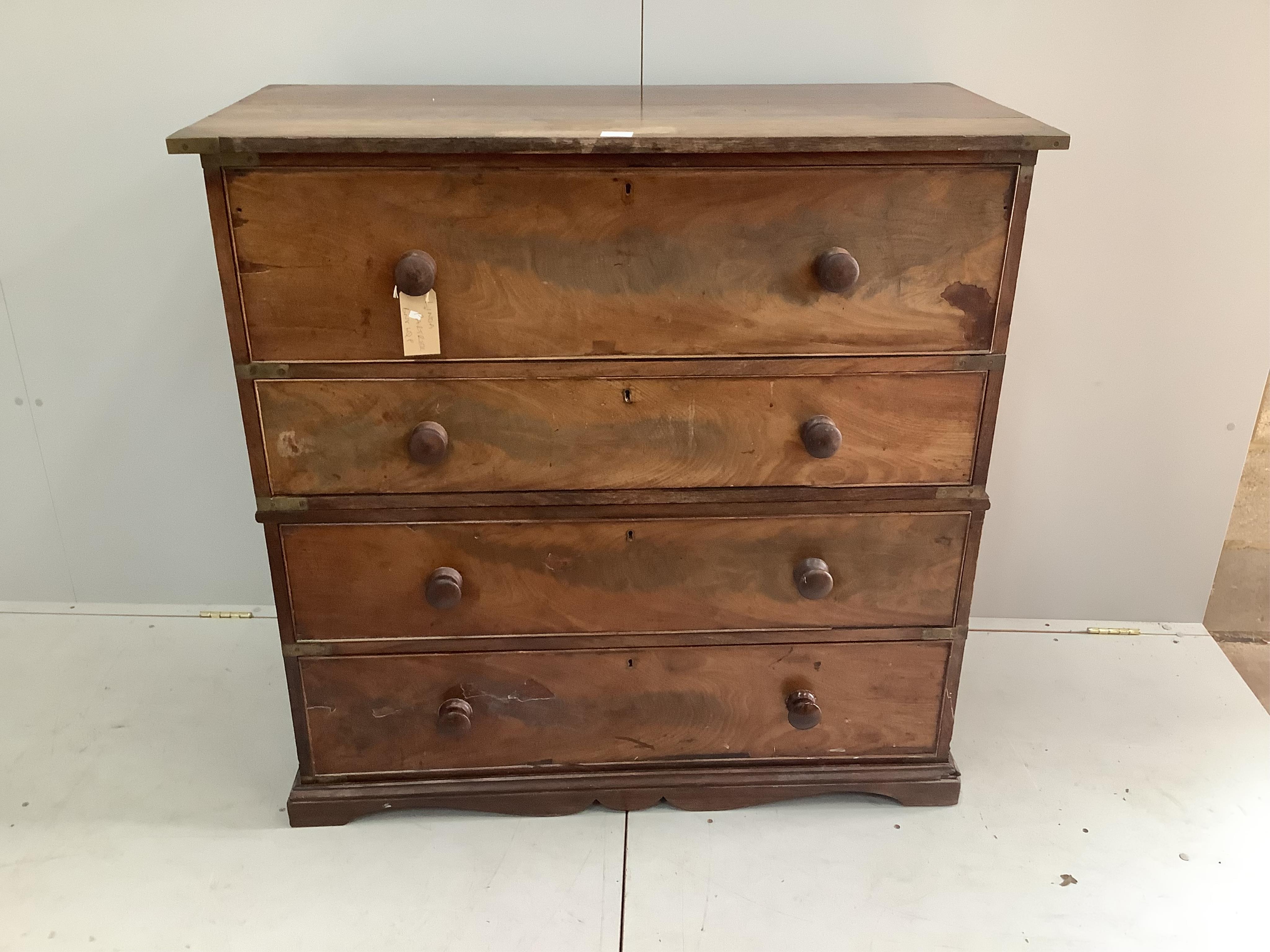 A 19th century hardwood two section military chest, the top drawer fitted as a secretaire, width 114cm, depth 54cm, height 111cm. Condition - poor